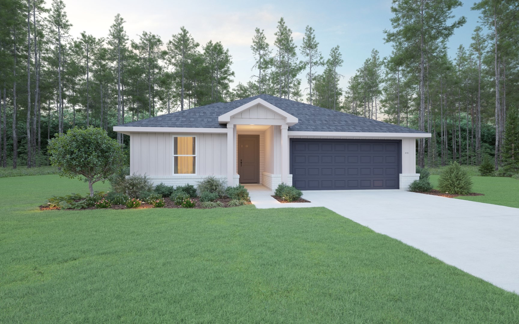 A single-story house with light-colored siding, a dark gray shingled roof, and a two-car garage sits on a well-manicured lawn, surrounded by trees and landscaped bushes.