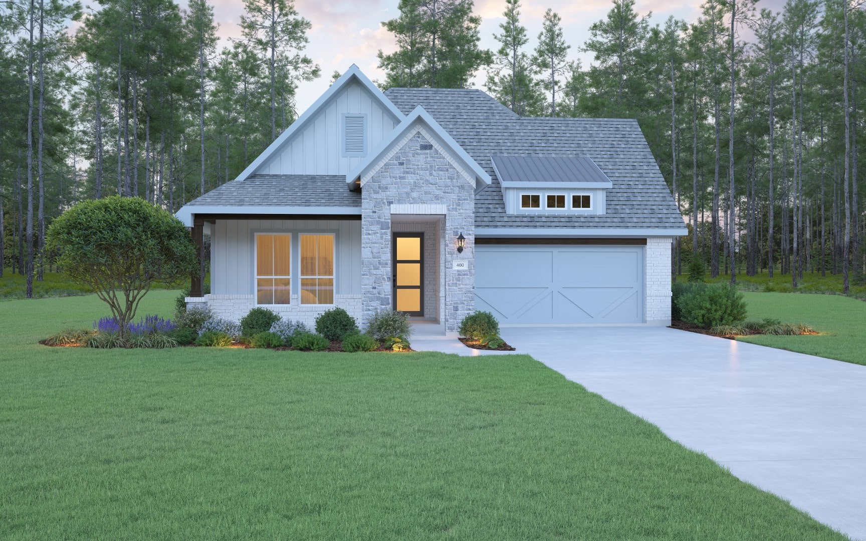 A modern single-story house with gray brick and siding, large front windows, a two-car garage, and a well-maintained lawn, surrounded by tall trees.