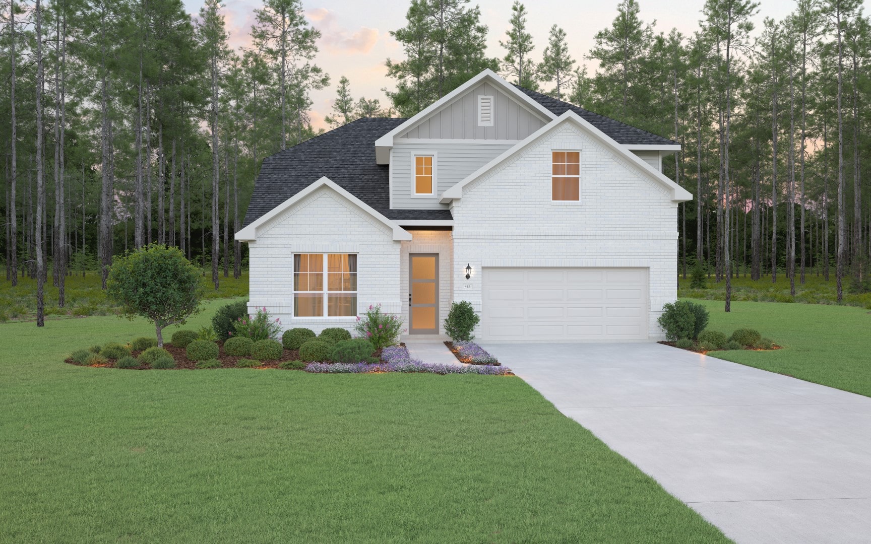 A two-story white brick house with black roof, large windows, and a double garage, surrounded by a well-manicured lawn, shrubs, and trees, with a forest in the background and a clear driveway in front.